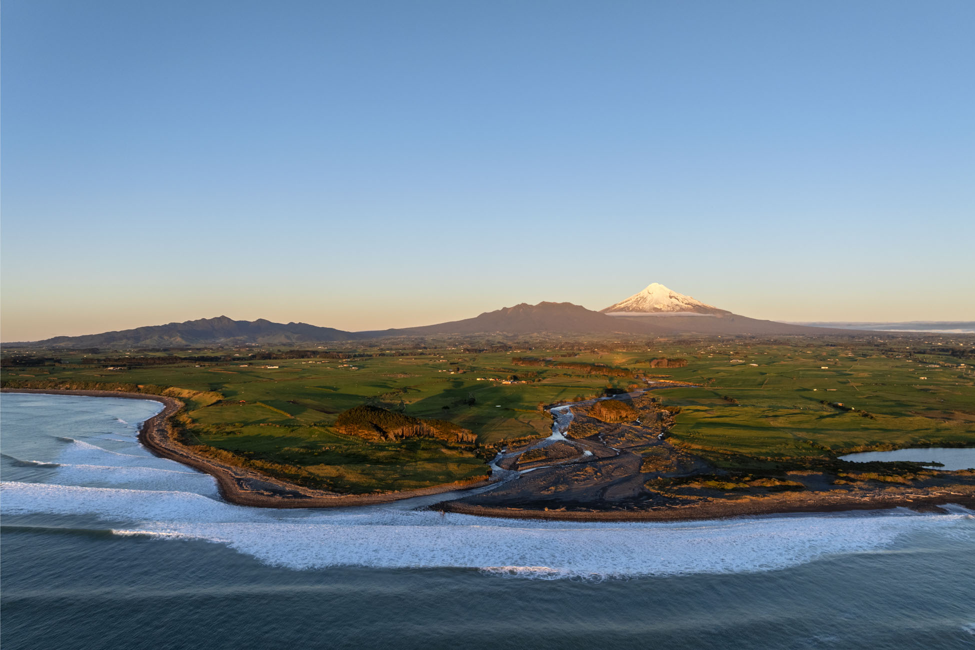 Taranaki Maunga, Pouakai and Kaitake aerial photo with Hangataahua river mouth and coastal Puniho