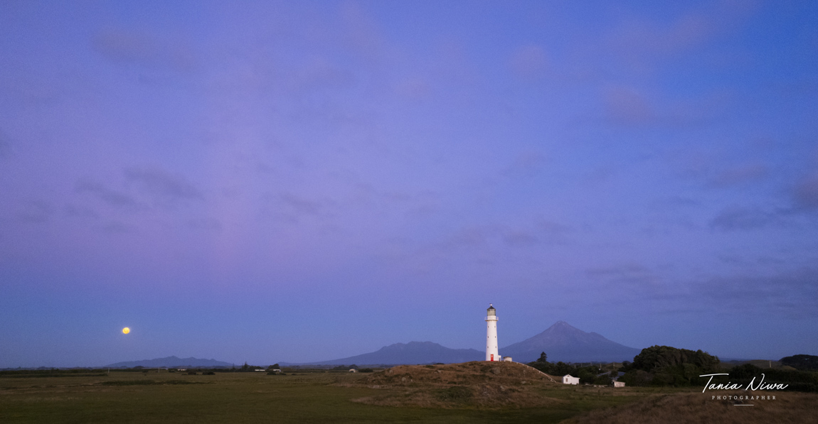 cape rd lighthouse full moon rising over Kaitake range with Mt Taranaki